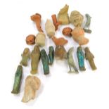 A collection of terracotta and pottery heads, and a selection of turquoise Egyptian figures. (a quan