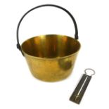 A 19thC brass jam pan, with iron swing handle, 17cm high, 31cm diameter, and a wall hanging brass ja