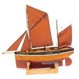A wooden scale model of a traditional fishing boat, Silver Darling, Lowestoft, with fully rigged sal