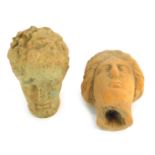 A pair of Roman style terracotta heads, 10cm and 12cm high.