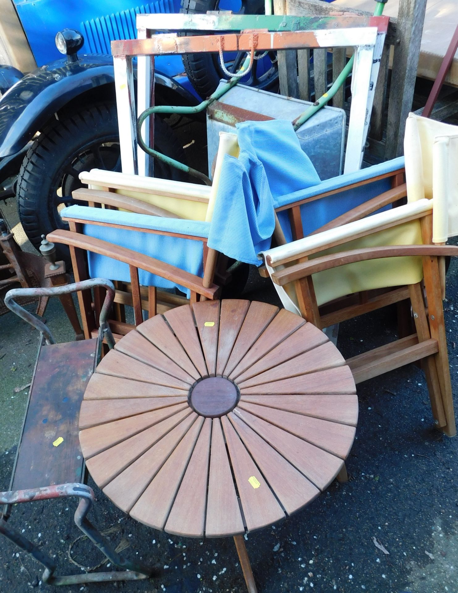 Assorted garden wares, comprising two metal trestles, four collapsible chairs, circular side table,