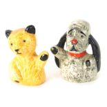 A pair of pottery figures, Sooty and Sweep, 6cm high, with card written: The Figures Were Given Away