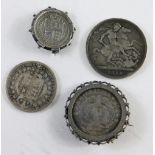 Various coins, a Queen Victoria 1889 crown, mounted African 1894 2½ shilling, and two others. (4)