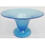 A 20thC Walsh opalescent blue glass vase, with compressed trumpet stem on circular foot with rough p