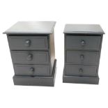 A matched pair of grey painted pedestal cabinets, 61cm high, 38cm wide, 29cm deep, etc. (2)