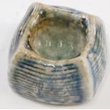 An early 20thC Martin Brothers type pottery ashtray, the square body with ribbed edge, in blue glaze