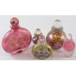 Various 20thC opalescent glass perfume bottles, to include Isle of Wight glass, profusely decorated