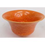 An early 20thC Royal Lancastrian orange pottery bowl, in the manner of Radford, vibrantly decorated