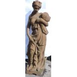 A large and heavy 20thC cast iron garden statue, figure of a lady in flowing classical robes holding