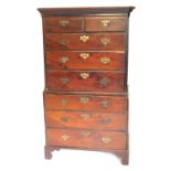 A George IIII mahogany tallboy or chest on chest, having moulded cornice, canted top with two short