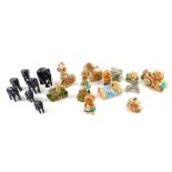 A collection of ebony and bone elephants, Pendelfin and various Lilliput Lane figures.