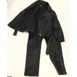 A Lewis black leather jacket, size 4, with leather trousers.