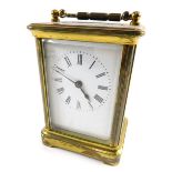 A 20thC brass carriage clock, the 5cm wide dial with stencilled Roman numerals fitted in a five part