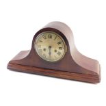 An Edwardian mahogany Napoleon hat mantel clock, with silvered dial.