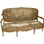 A Louis XVI style giltwood show frame sofa, with tapestry upholstery (AF), 204cm over arms.