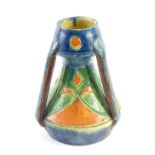 A Linthorpe style Art Nouveau pottery tyg, numbered 146, vibrantly decorated in orange, green, and b