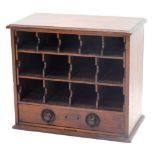 A set of 19thC mahogany pigeon holes, the top with a moulded edge above various divisions and a draw
