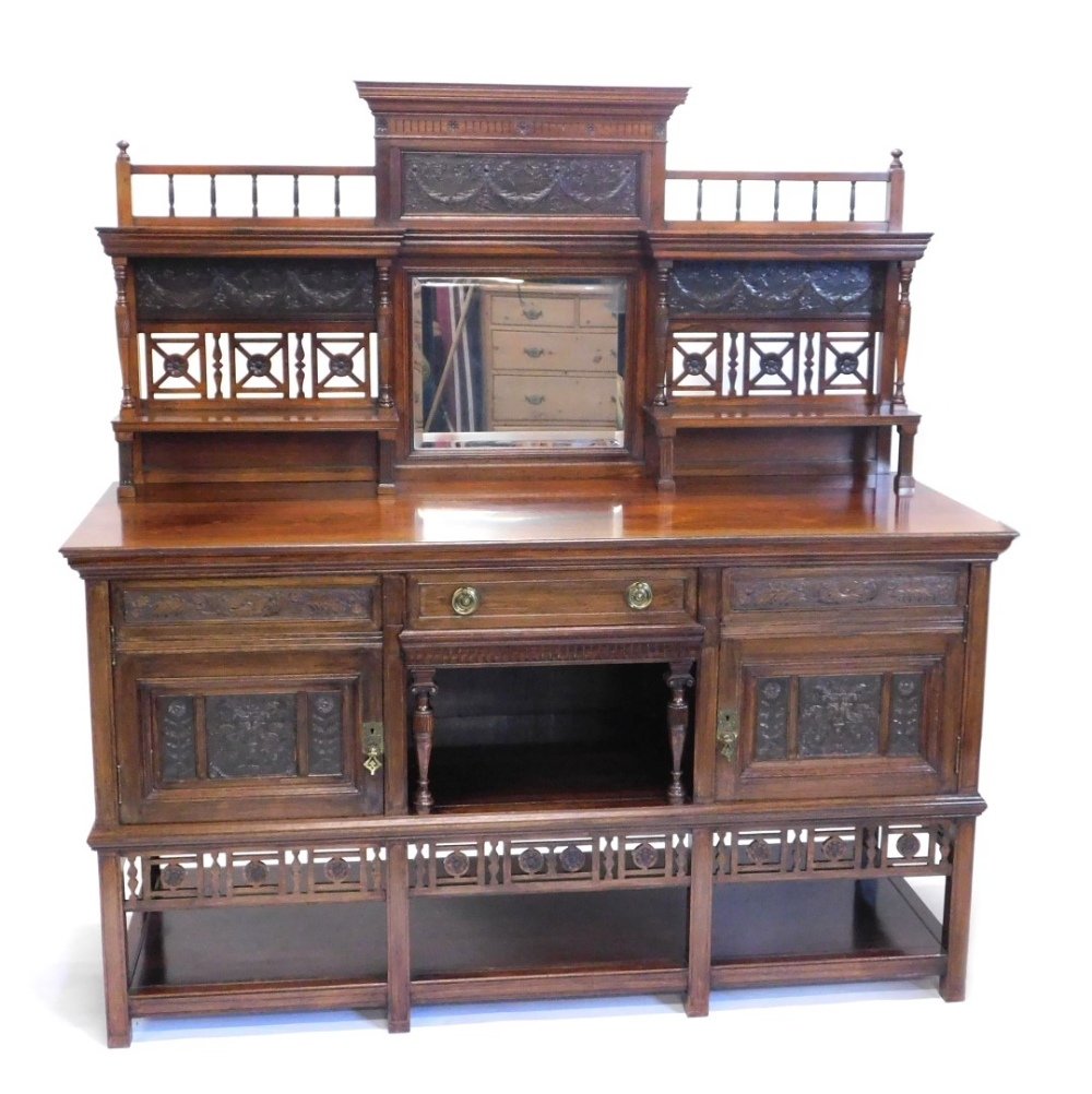 A 19thC aesthetic rosewood sideboard, in the manner of Lamb of Manchester, with central bevel glass