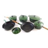 A collection of green enamel Le Creuset pans, to include oval casserole dish, skillet, etc.