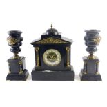 An associated late 19thC French clock garniture, comprising portico shaped clock with dome, cast bra