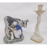 A 20thC Copenhagen B&G figure of a milkmaid and cow, number 2017, printed marks beneath, 20cm high a