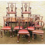 A Chippendale design mahogany dining room suite, comprising extending D end table, on heavy cabriole