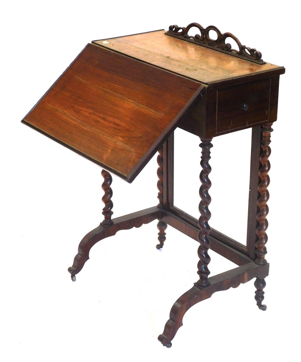 A Victorian rosewood side table, with fret work top, drop leaf, and drawer stamped PoSPEICH Genova,