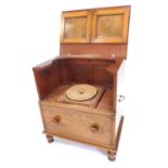 A 19thC mahogany box commode, the hinged panel front above single drawer on turned legs with brass s