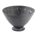 A Wedgwood Keith Murray design black basalt bowl, impressed and printed marks to underside, 17cm dia