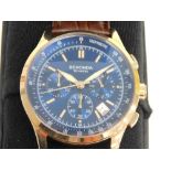 A Sekonda 50 meter tachymeter wristwatch, the blue 3.5cm dial with gilt coloured baton points and nu