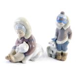 A Lladro pottery figure of a child aside polar bear, number 5238, another child seated aside polar b