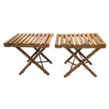 Two beech folding and adjustable luggage stands, 71cm wide.