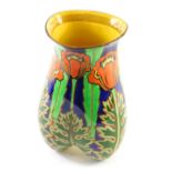 A 20thC Art Nouveau Bursleyware pottery vase, vibrantly decorated with flowers, predominately in gre