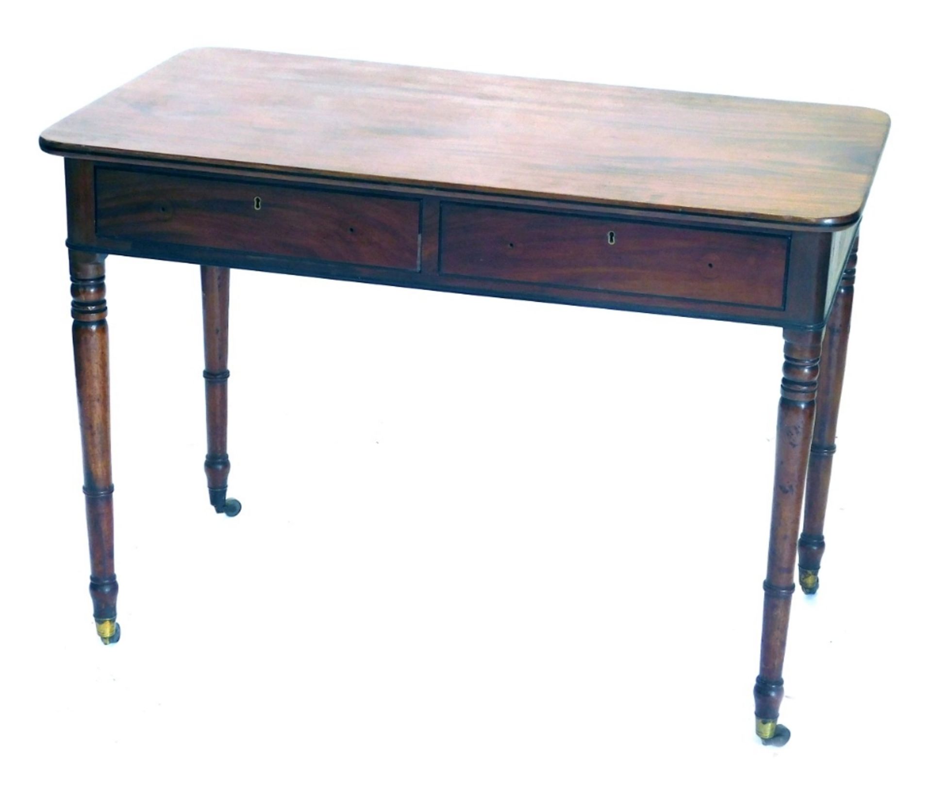 A George III mahogany side table, with rounded rectangular top, two frieze drawers, turned legs, and