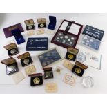 Various coins, St Helena 1673-1973 cased coin, various other cased, Pobjoy Mint Silver Jubilee crown