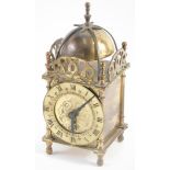 A 20thC Smiths Clocks and Watches brass miniature lantern clock, with bell top, 8cm diameter Roman n