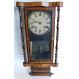 A late 19thC American walnut and parquetry wall clock, the paper dial with Roman numerals, the case