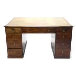 A 19thC mahogany partner's kneehole desk, rectangular top with a green leather inset detailed with G