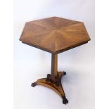 A 19thC mahogany and yew wood specimen table, the hexagonal top inlaid with various sections, on a t