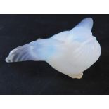 A Sabino opalescent glass figure of a chick, with wings outstretched, marked beneath, 6cm wide.