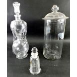 An early 20thC cut glass inverted decanter, with shaped stopper, double gourd shaped body and circul