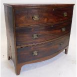 An early 19thC mahogany bowfront chest of three drawers, with bracket feet, 103cm wide. (AF)