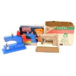 A Vulcan Junior child's sewing machine, and a Singer Sew Handy Model 40K sewing machine, boxed. (2)