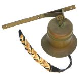 A brass hanging ships bell, with wall mounted bracket, 42cm high, the bell 25cm high, unmarked.