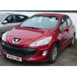 A Peugeot 308 Millesim, Registration AF60 SBZ, five door hatchback, petrol, red, first registered 30