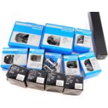A group of bicycle parts, to include Shimano flat pedals, Shimano Ultegra pedal clips, etc. (1 box)