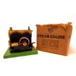 A Merritt standard number 1540 steam engine, partially boxed.