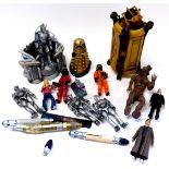 A group of Doctor Who collectables, Dalek, Sonic Screwdrivers, Cybermen, Rose, David Tennant Doctor,