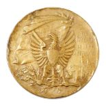 A 19thC Swiss shooting related bronzed medallion, the observe depicting an eagle and the phrase 'Tir