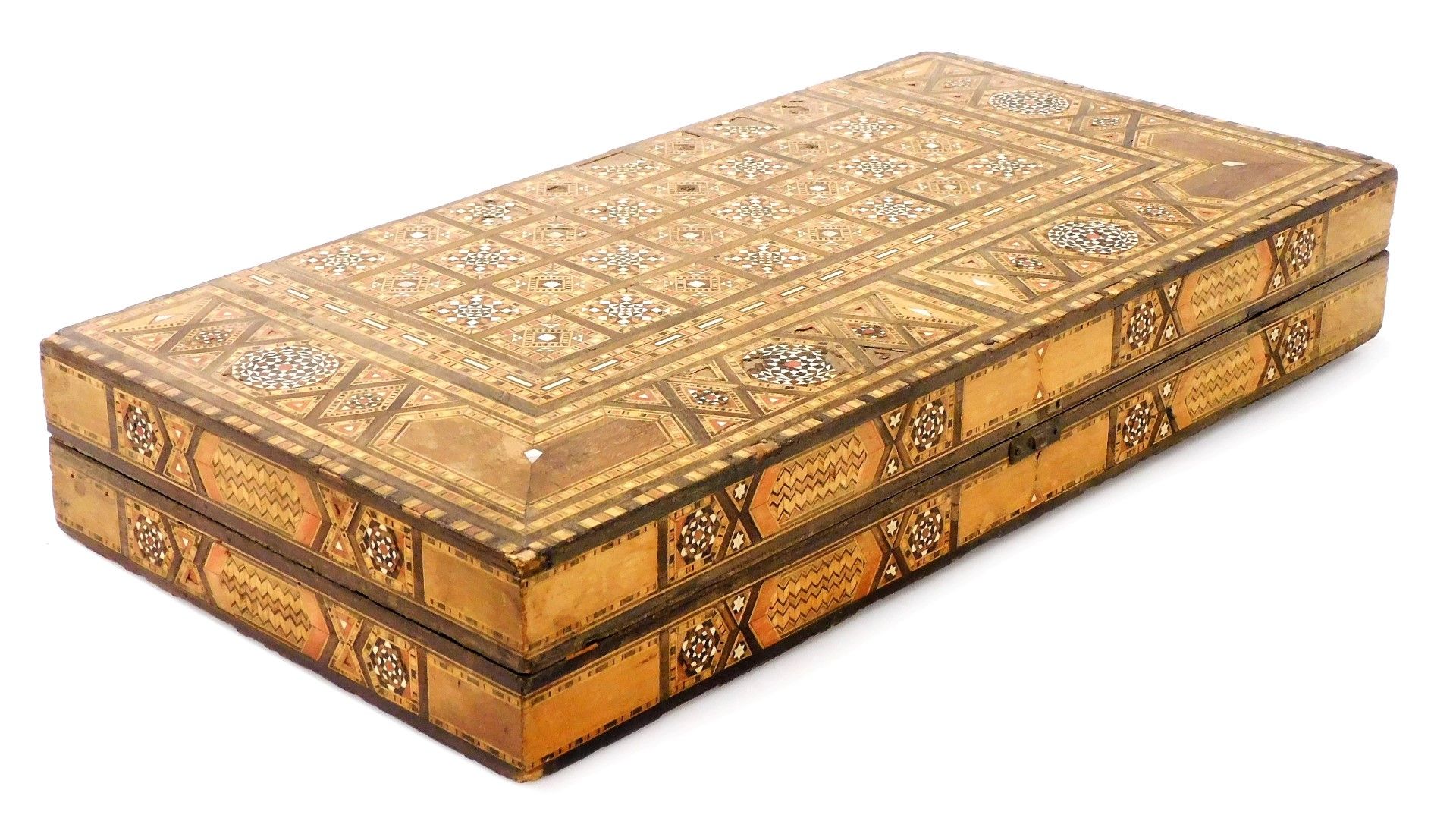 A Moorish inlaid backgammon box, profusely inlaid with finely detailed parquetry panelling and with